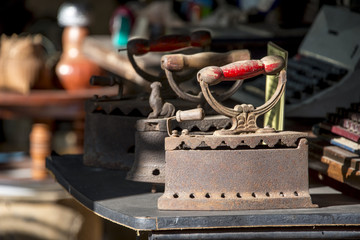 old style iron, used by putting hot charcoal inside to heat the iron