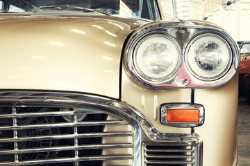 Close Up of Headlight Lamp Vintage Classic Car. (Vintage Effect Style)