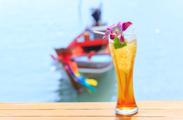 Ice tea. Tropical cocktail on long tail background Thailand Samui