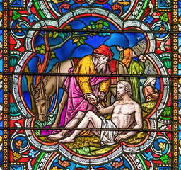 Good Samaritan stained glass window - obrazy, fototapety, plakaty