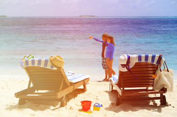 happy couple relax on beach