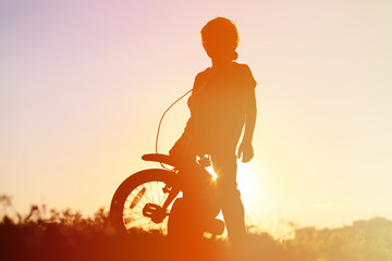 little boy riding bike at sunset, kids sport