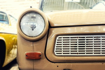 Close Up of Headlight Lamp Vintage Classic Car. (Vintage Effect Style)