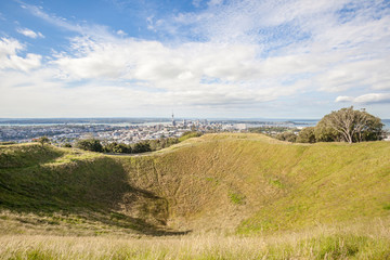 The Mount Eden with Auckland city view background.