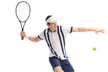 Young tennis player hitting a return