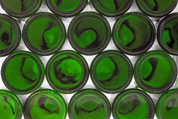 Beer bottles of green glass background, glass texture