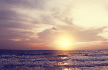 Naklejka na ściany i meble Over Sea Setting Sun [Blur and Select focus background]
