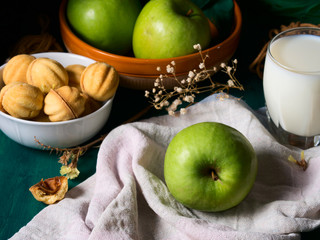 Still life with apples and cookies