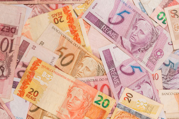 Fototapeta na wymiar Brazilian money. A lot of real notes.