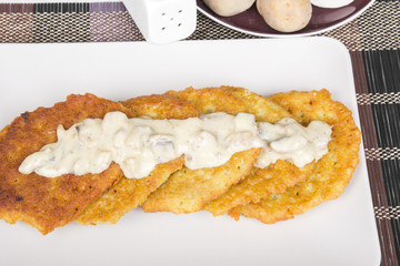 potato pancakes with mushroom sauce
