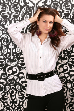 beautiful young woman in a shirt with a belt