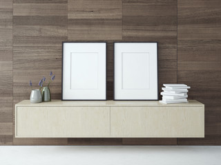 Blank picture frames on a dark wood wall. 3D rendering