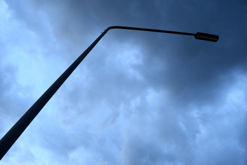 Street light poles and Cloudy storm