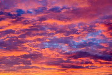 Naklejka na ściany i meble Sunset Clouds Background