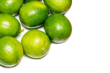 Fresh limes isolated on white.