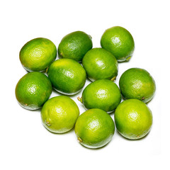 Fresh limes isolated on white.