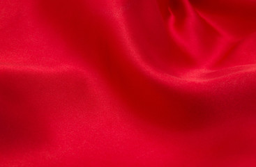red satin or silk fabric as background