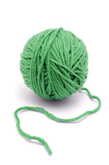 Ball of yarn on white background