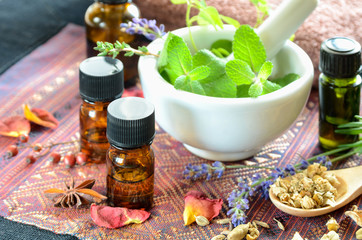 essential oils for aromatherapy treatment with herbs