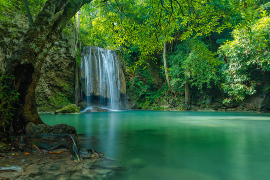 Green nature landscape with turquois waterfall © peangdao