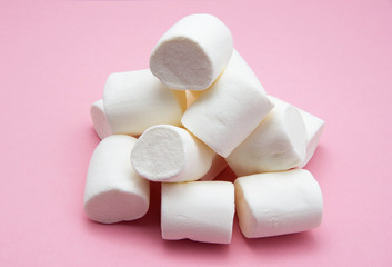heap of marshmallow on pink