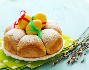 Traditional Easter cakes with colored eggs.