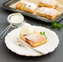 Homemade cakes and puff pastry with apples and caramel.