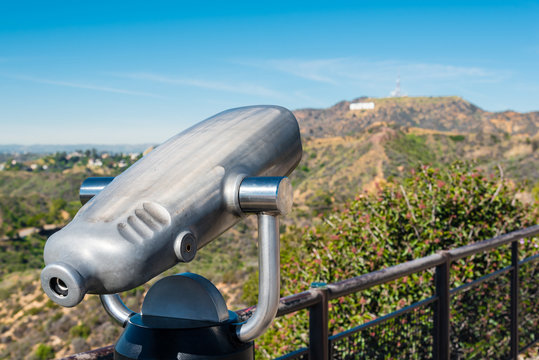 coin operated binoculars aiming at Hollywood hills. 