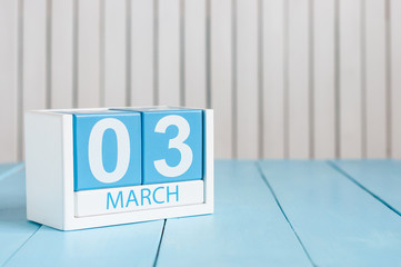 March 3rd. Image of march 3 wooden color calendar on white background.  Third spring day, empty...