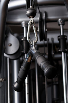 Closeup picture of hanging handle in a gym