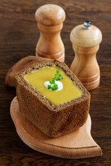 Lentil soup in the bowl of bread.