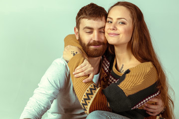 Studio shot of beautiful young couple