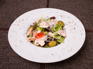Fresh village salad with champignons.