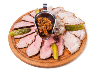 Delicious sliced roast beef with caramelized onion.