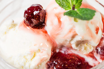 Vanilla ice cream with strawberry jam.