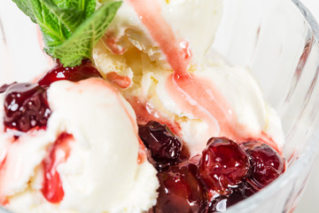 Vanilla ice cream with cherry jam.