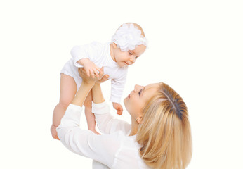 Happy smiling mother and baby playing on white background