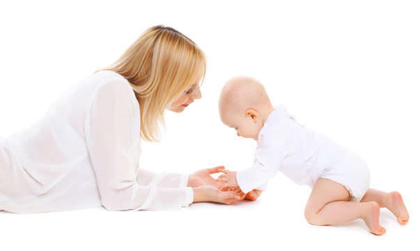 Mother playing with baby on a white background