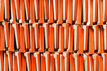 Orange brick stack in construction site, Texture Background