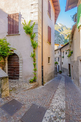 Fototapeta na wymiar Picturesque small town street view in Limone, Lake Garda Italy.