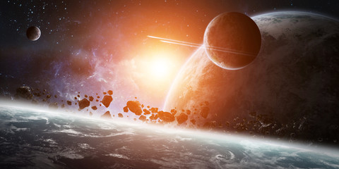 Sunrise over group of planets in space © sdecoret