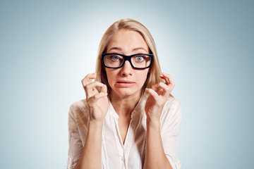 Closeup portrait stressed, frustrated shocked business woman yelling screaming temper tantrum isolated wall background. Negative human emotion facial expression reaction attitude