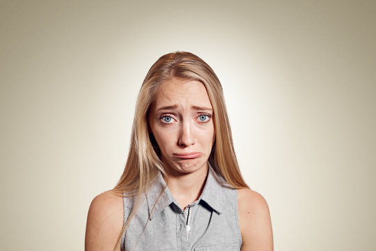Closeup portrait stressed frustrated woman crying or weep having temper tantrum isolated on wall background. Negative human emotion facial expression reaction attitude