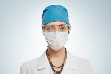 Close up of a pretty female surgeon. Looking confident and professional.