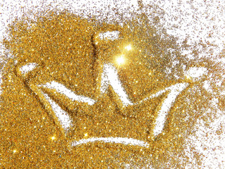 Abstract crown of golden glitter on white background 