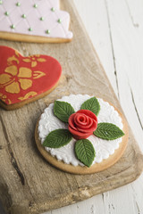 Decorated cookies with wedding, heart and flower cake shape