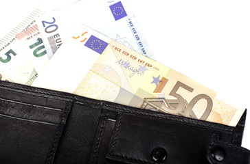 Euro banknotes in nominal value 5, 10, 20 and 50 in black purse.