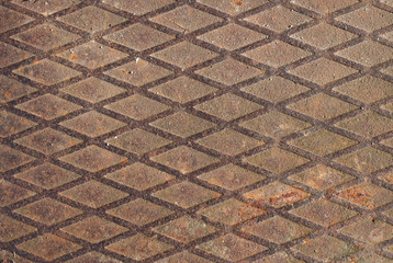 Diagonal pattern on an old iron plate