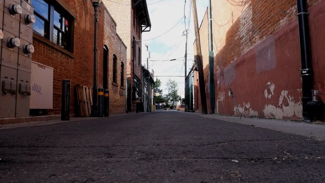 Dolly shot of an alley in the city