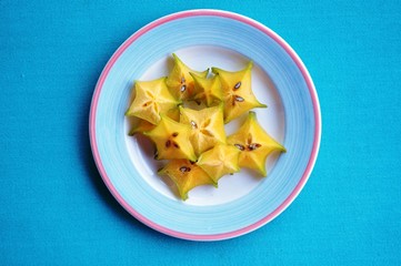Plate of sliced star fruit (carambola)